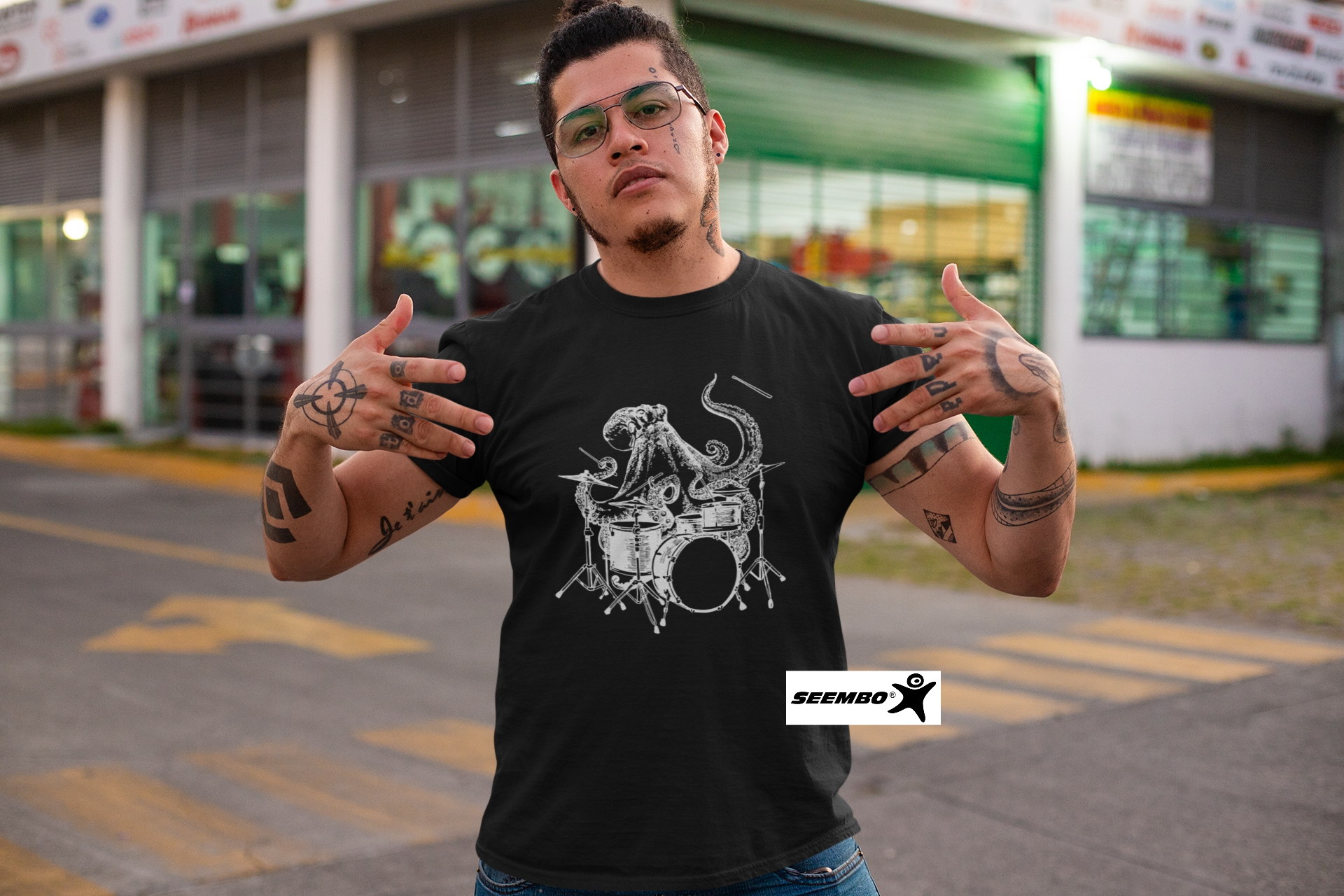 seembo-octopus-playing-drums-black-t-shirt-of-a-man-showing-swag-on-the-street-ipe65