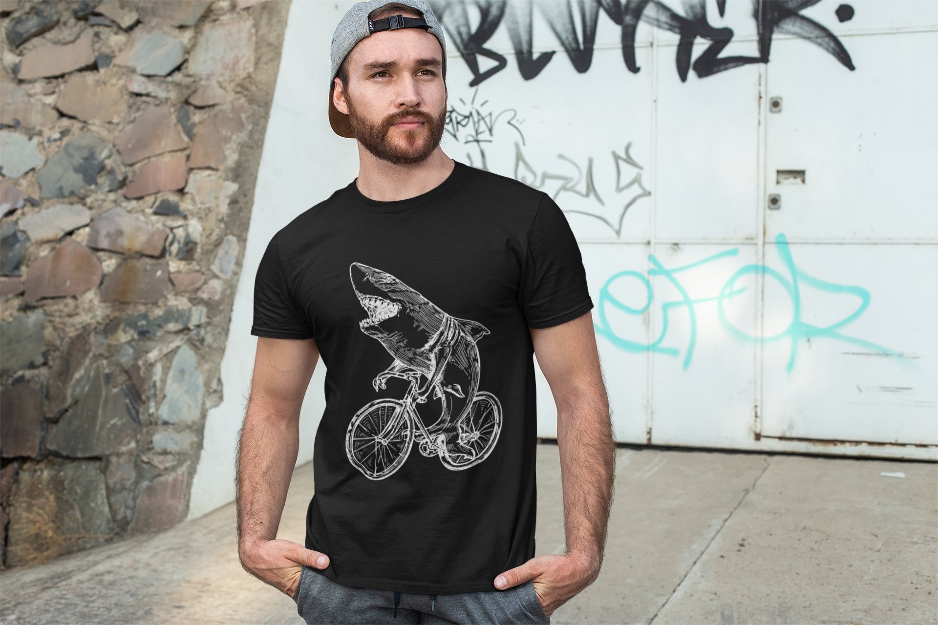 seembo-t-shirt-shark-cycling-bicycle-bike-of-a-man-posing-in-front-of-a-graffiti-wall