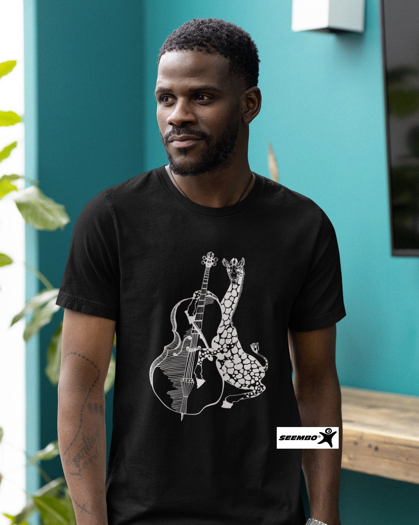 man-wearing-black-t-shirt-with-giraffe-playing-cello-design