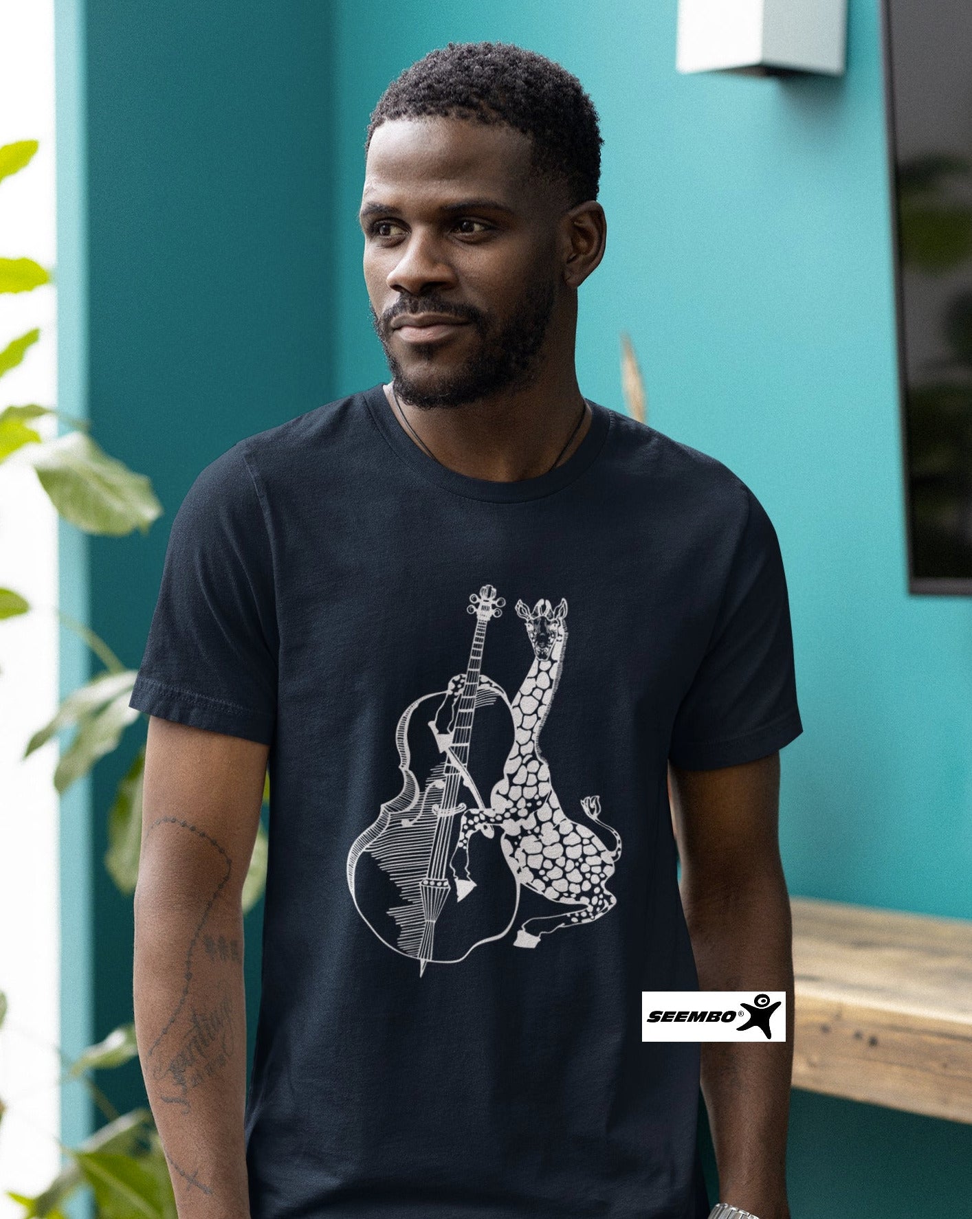 man-wearing-navy-t-shirt-with-giraffe-playing-cello-design