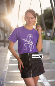 seembo-dinosaur-playing-guitar-purple-t-shirt-of-a-woman-wearing-at-sunset
