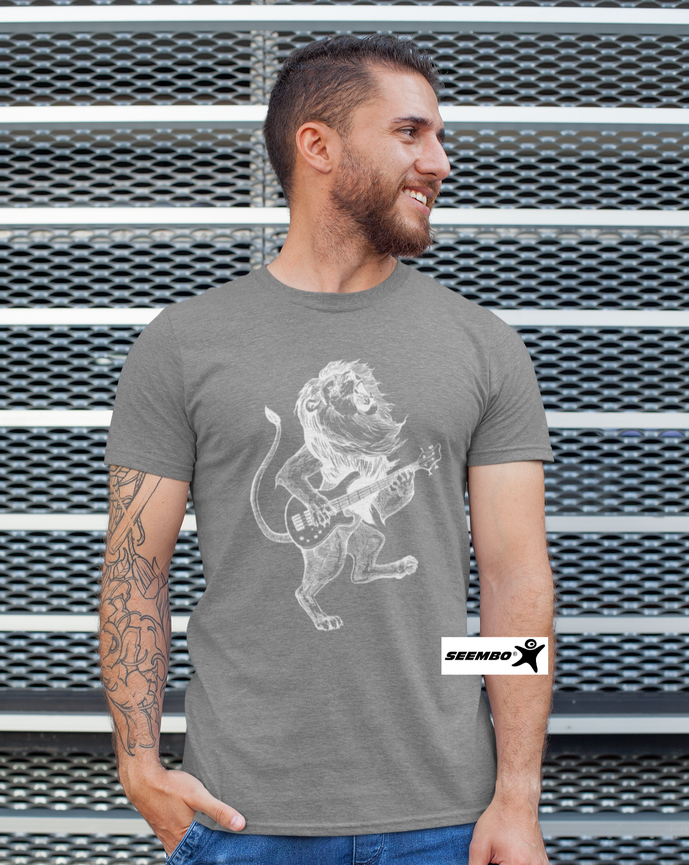 a-man-standing-with-seembo-t-shirt-with-lion-playing-guitar-guitarist-design-in-a-vintage-grey-color